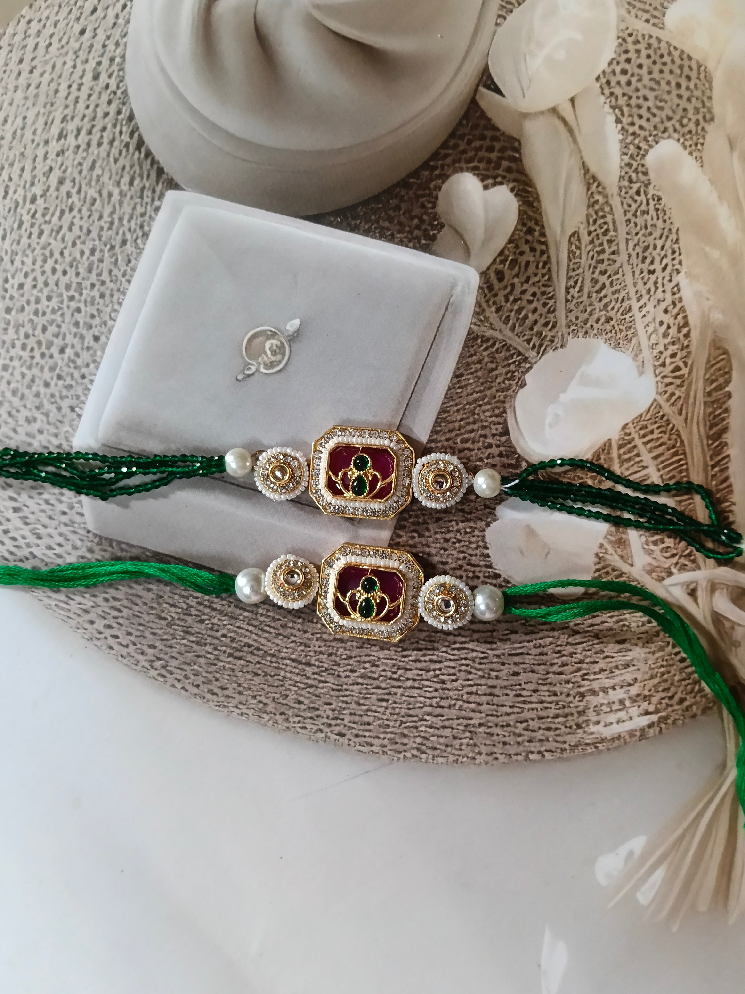 Green Kundan couple Rakhi